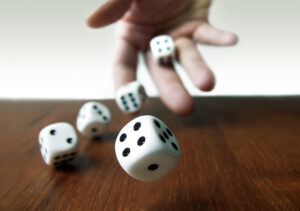 Hand rolling dice